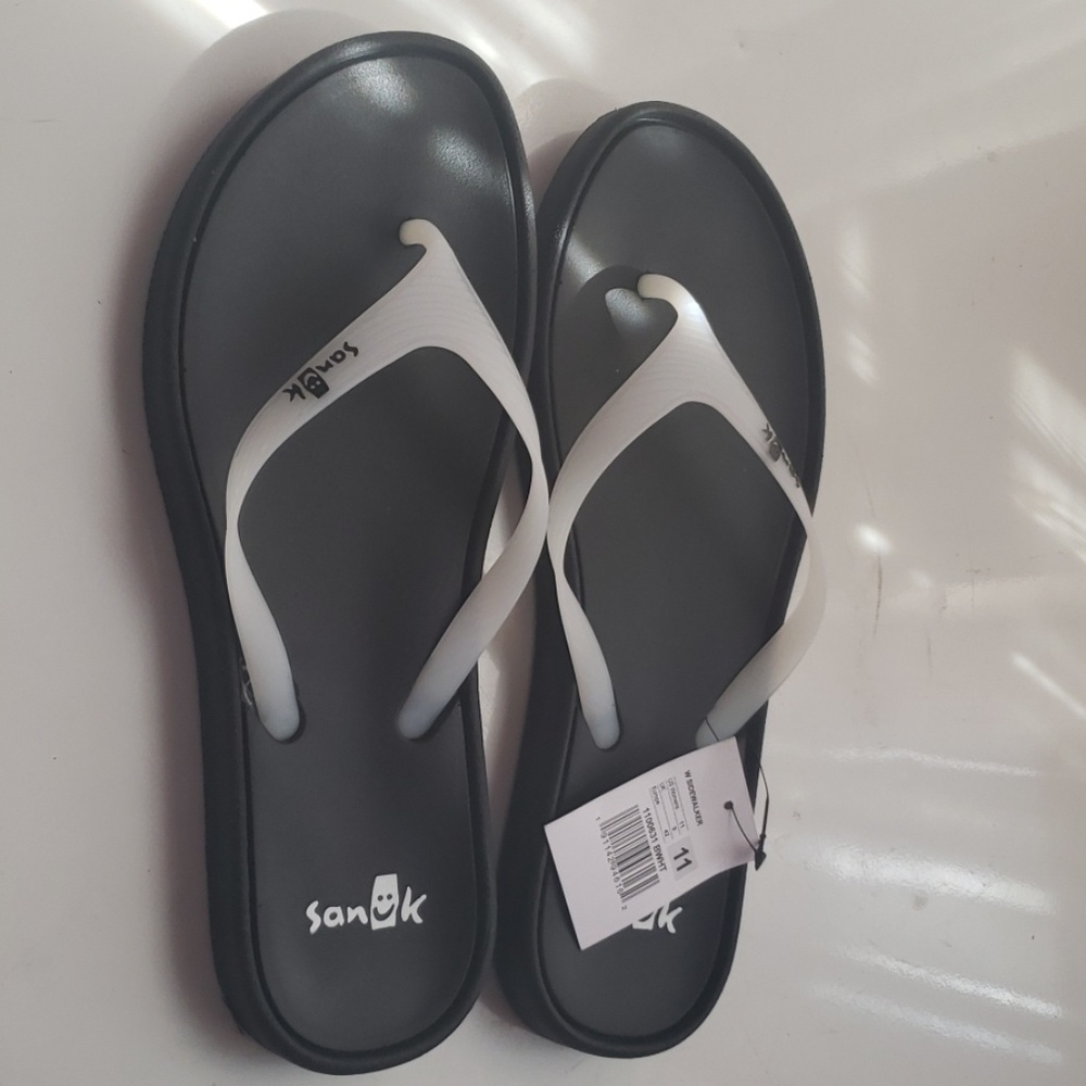 White/black Skywalker flip flops.